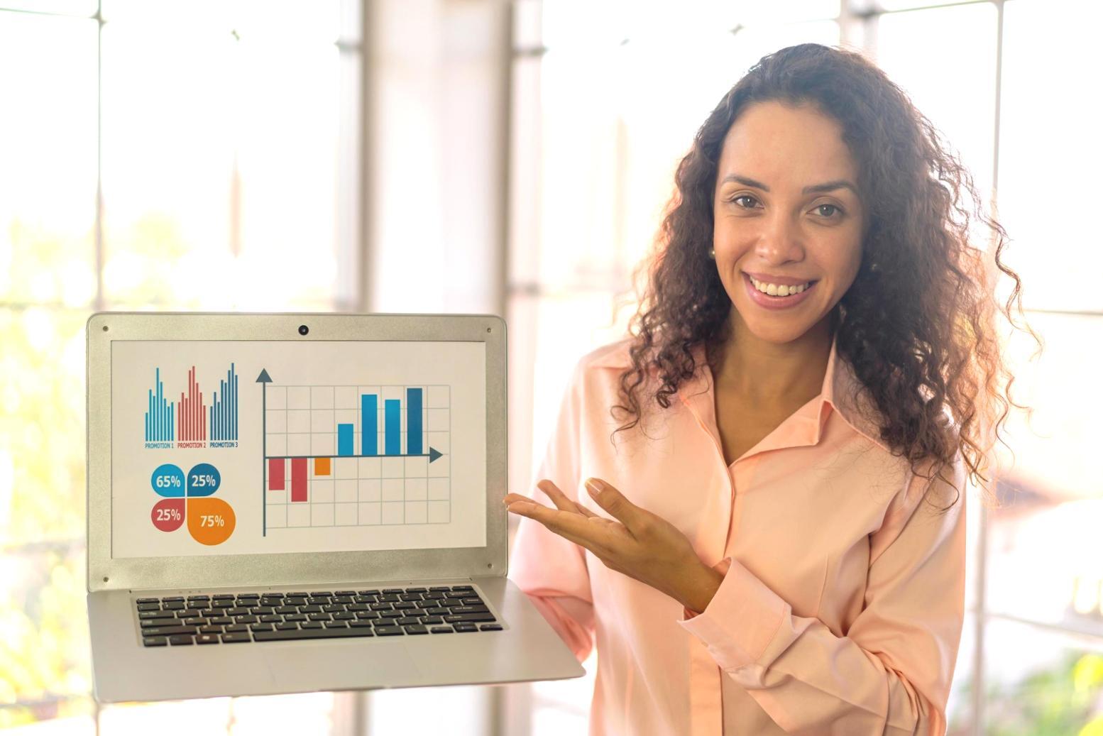 Person reflecting on financial goals with notebook and calculator